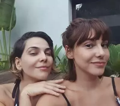   Tainá Müller con su hermana Tuti Müller